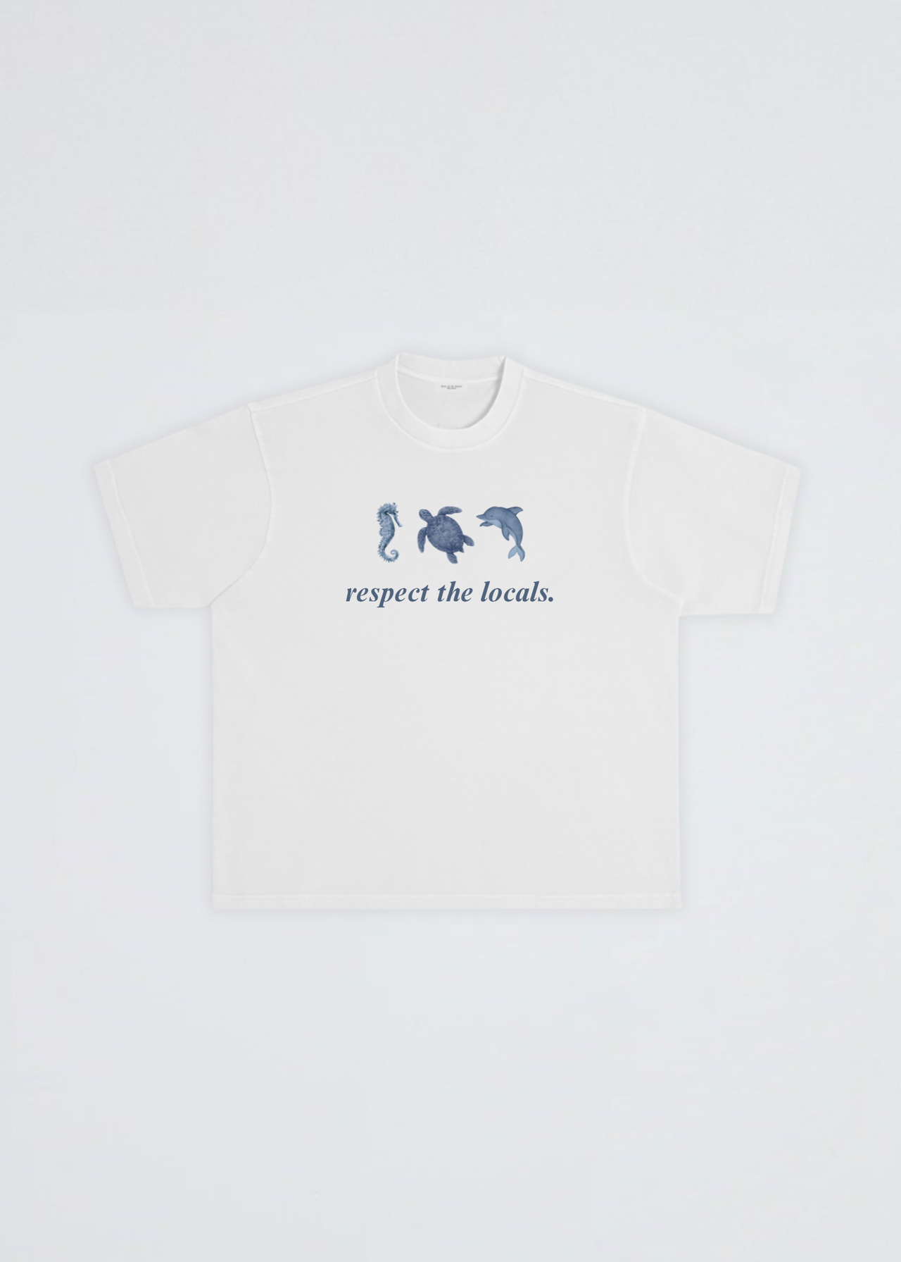A white short-sleeve crewneck t-shirt featuring a blue graphic of three sea creatures (seahorse, turtle, dolphin) above the text 'respect the locals.' on the chest, displayed flat against a light gray background.