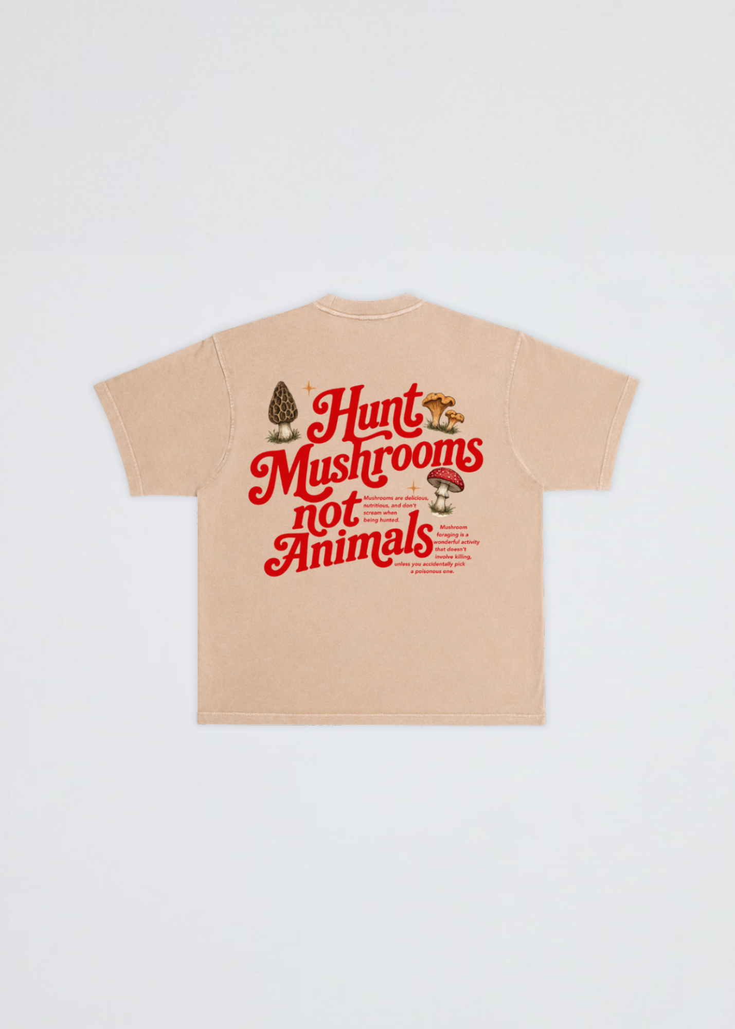 A beige short-sleeve t-shirt shown flat against a light gray background, featuring a graphic on the back with the text 'Hunt Mushrooms not Animals' in red, accompanied by illustrations of a morepenny and mushrooms.