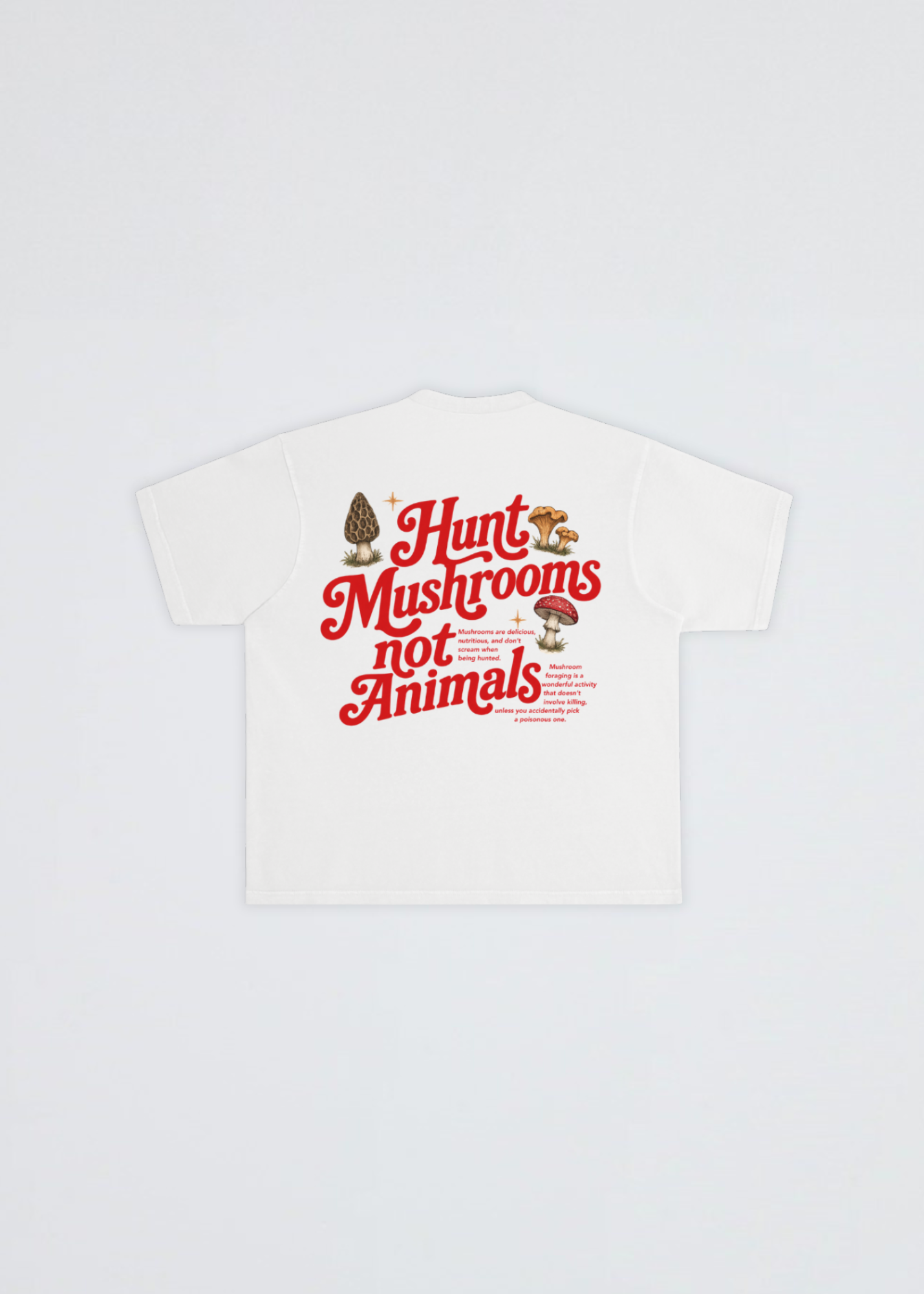 A white short-sleeve T-shirt laid flat against a light gray background, featuring a large red graphic text print that reads 'Hunt mushrooms not animals' with small mushroom illustrations.