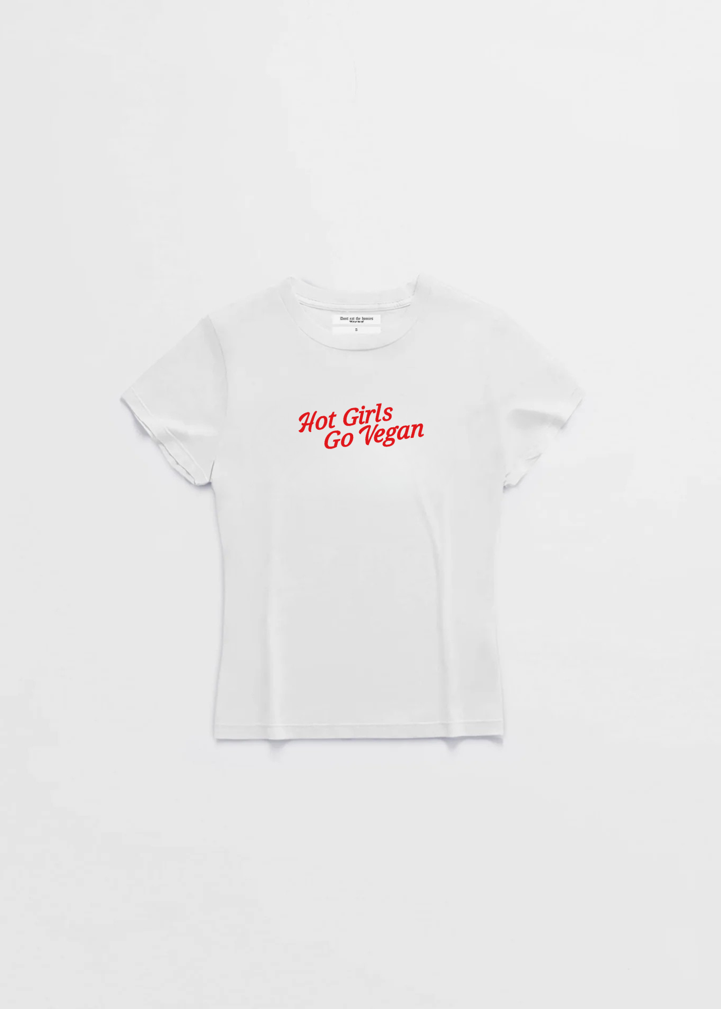 White t-shirt with red text 'Hot Girls Go Vegan' on a white background